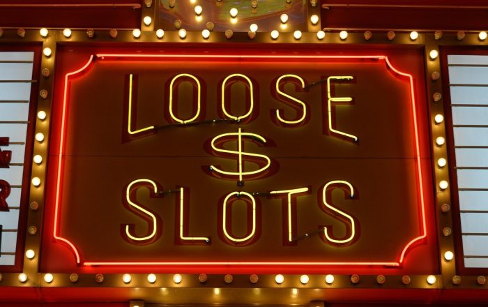 Casino sign bonus welcome offer displayed on a laptop screen with chips and cards for US players
